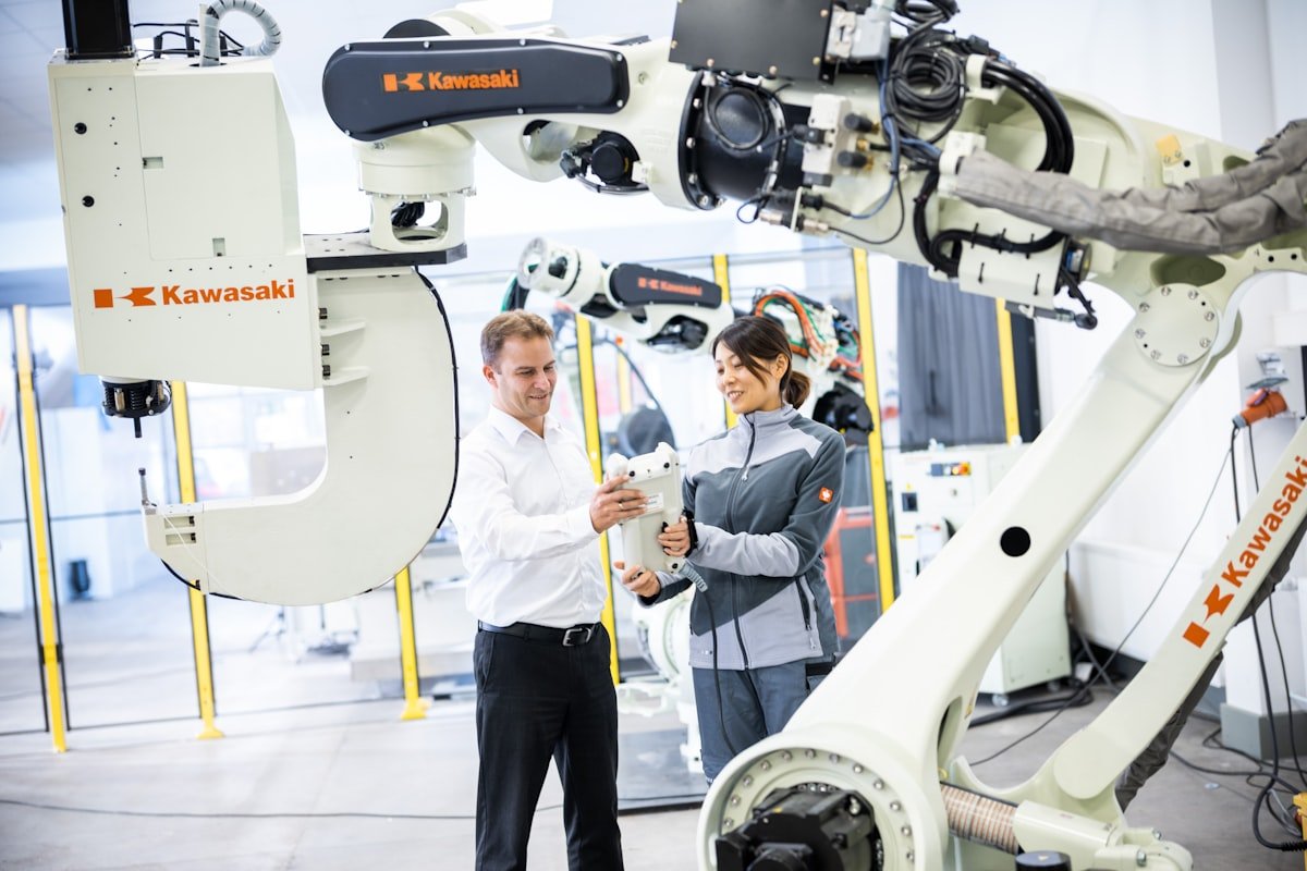 HTL engineers reviewing automated warehouse technology